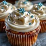 Soft vanilla Cancer Birthday Cupcakes adorned with shimmering pearl fondant details served.