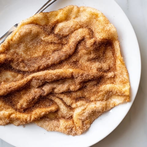 Imagine a plate piled high with warm, sugared Elephant Ears, smelling of fresh cinnamon and fried goodness.