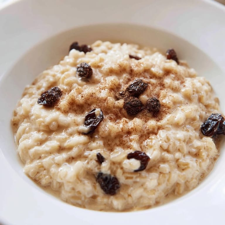 Warm rice pudding, infused with vanilla, provides a comforting taste of classic dessert flavors for everyone.