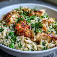 Creamy One-Pot Lemon Orzo with Chicken and Peas, a bright and comforting spring dinner in a single skillet.